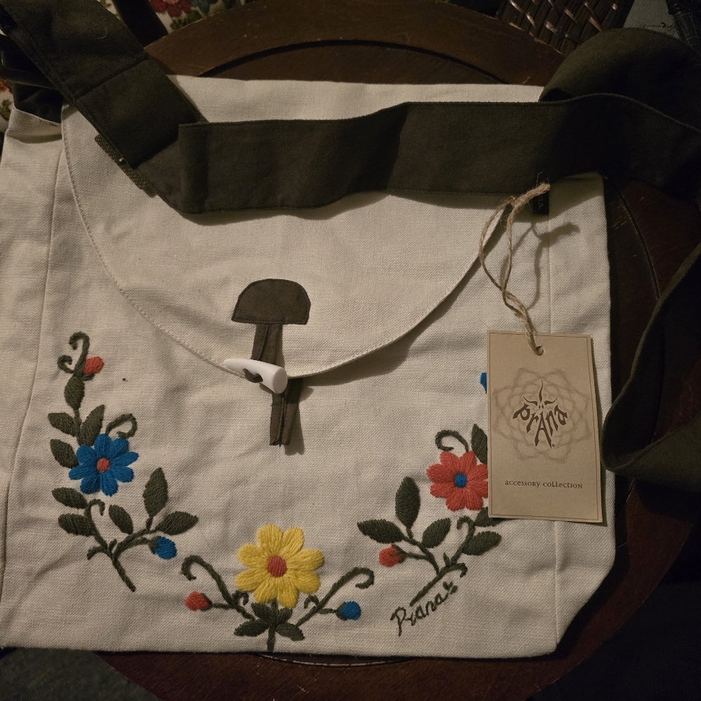 NEW - Tan Canvas Messenger Bag with floral design - new with tags - never used